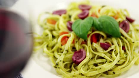 red wine with cooked pasta