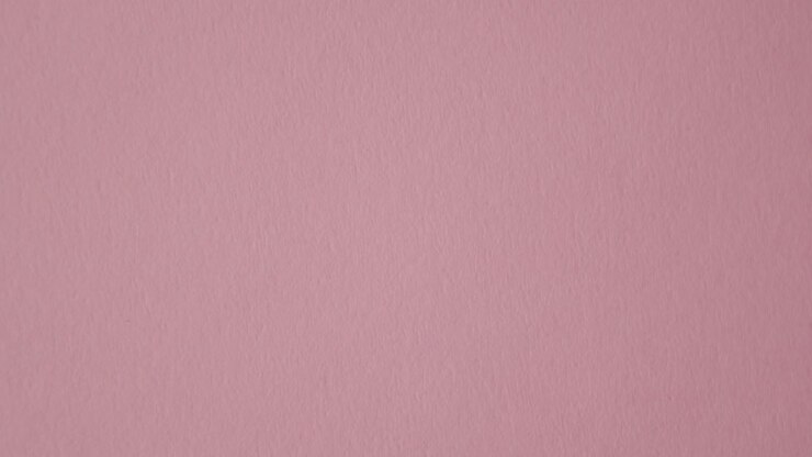 Hand Picking Up Heart Candy With Be Happy Message On Pink Background