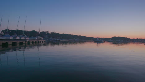 Slow-mo-leaving-a-Marina-with-Sail-and-motor-boats-In-New-York-in-the-evening