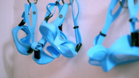 diving accessories with scuba goggles hanging to dry