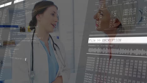 two female doctors standing in office, showing animated encryption code and data overlays
