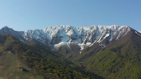 snow on mt daisen, aerial establishing shot, tottori prefecture japan