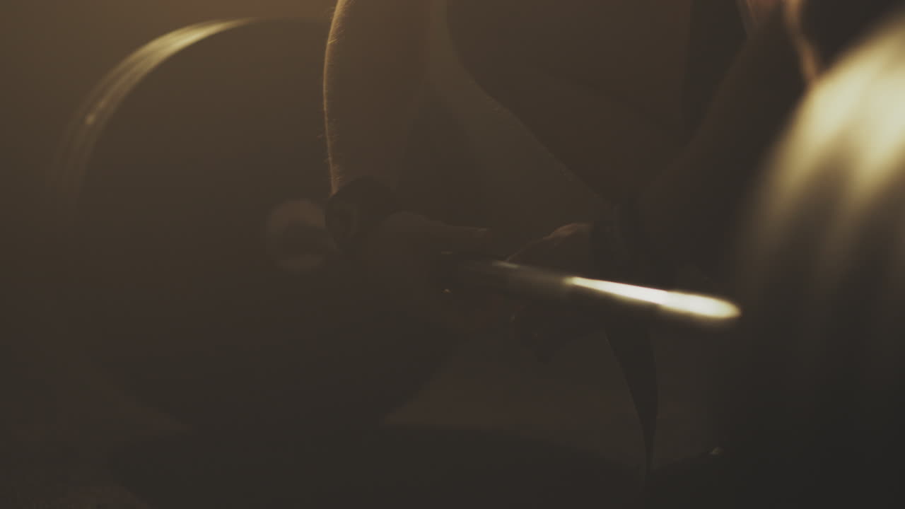 Man preparing to lift barbell