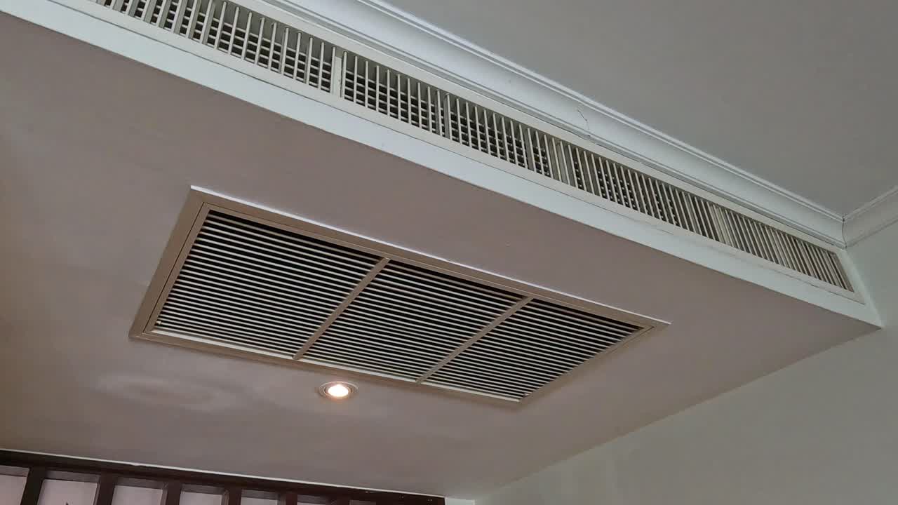 Air-con unit opening and closing on ceiling