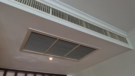 air-con unit opening and closing on ceiling