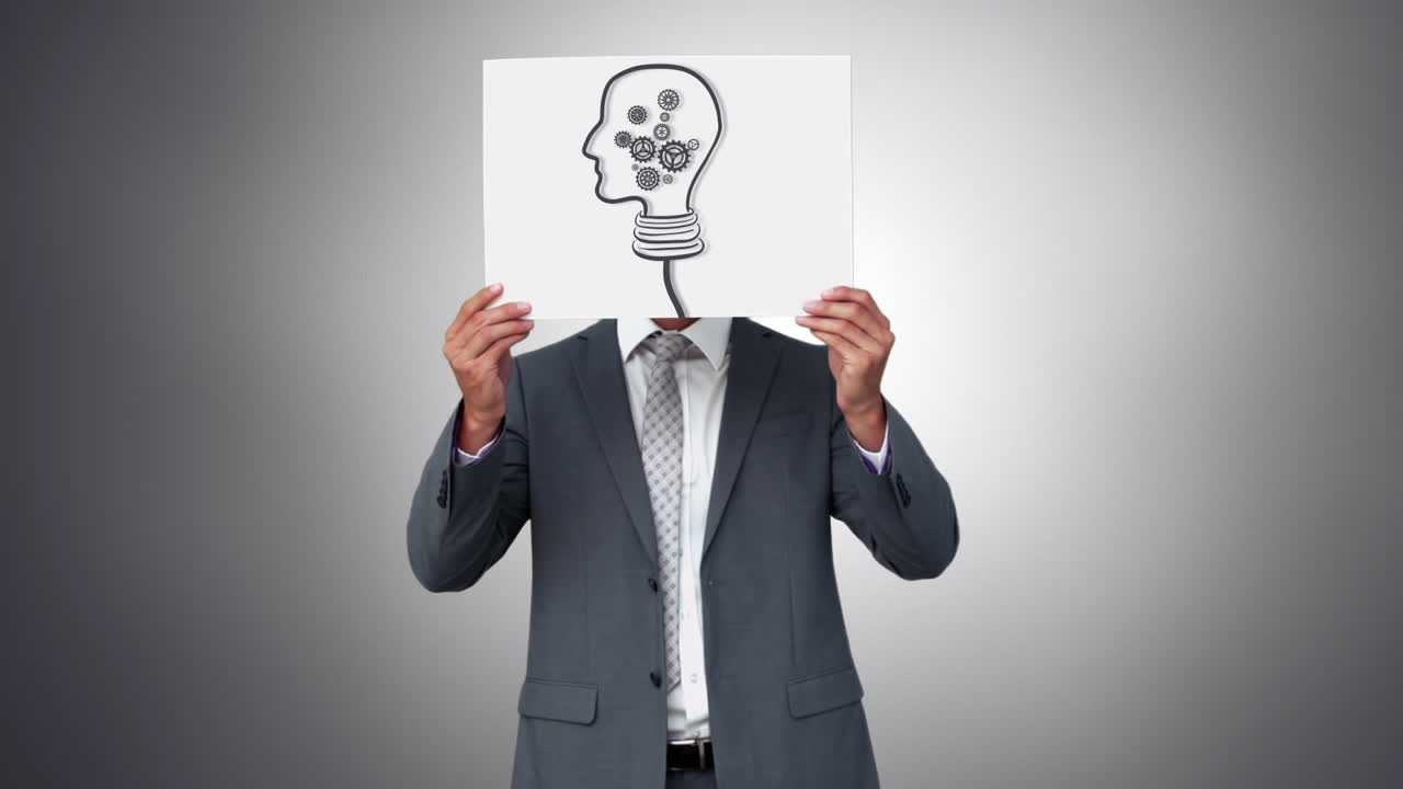 Businessman holding light bulb animation over face