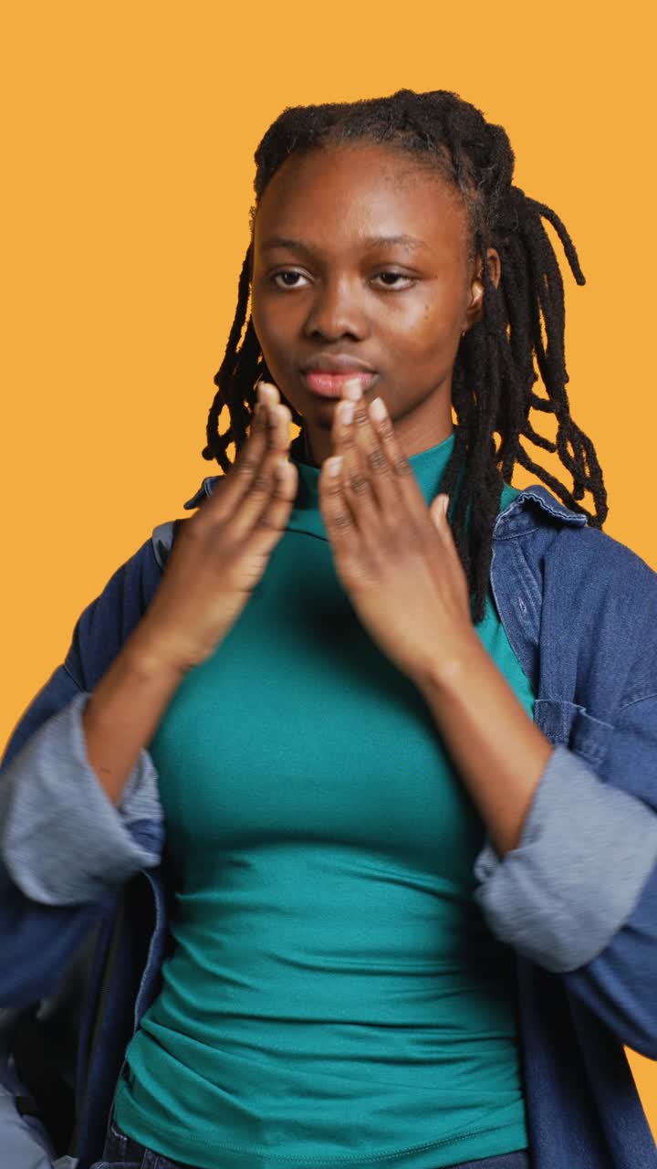 Young African American Woman Performing See No Evil Gestures