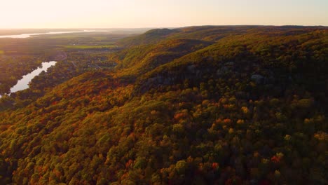 aerial view of the sun setting on the edge of the ottawa valley in autumn