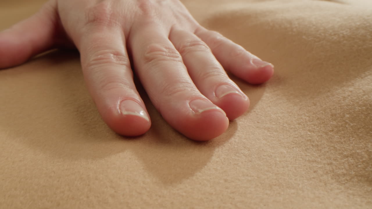 Hand on skin