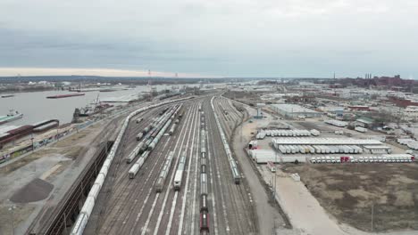 Aerial-dolly-in-above-railroad-loading-dock-on-Mississippi-River