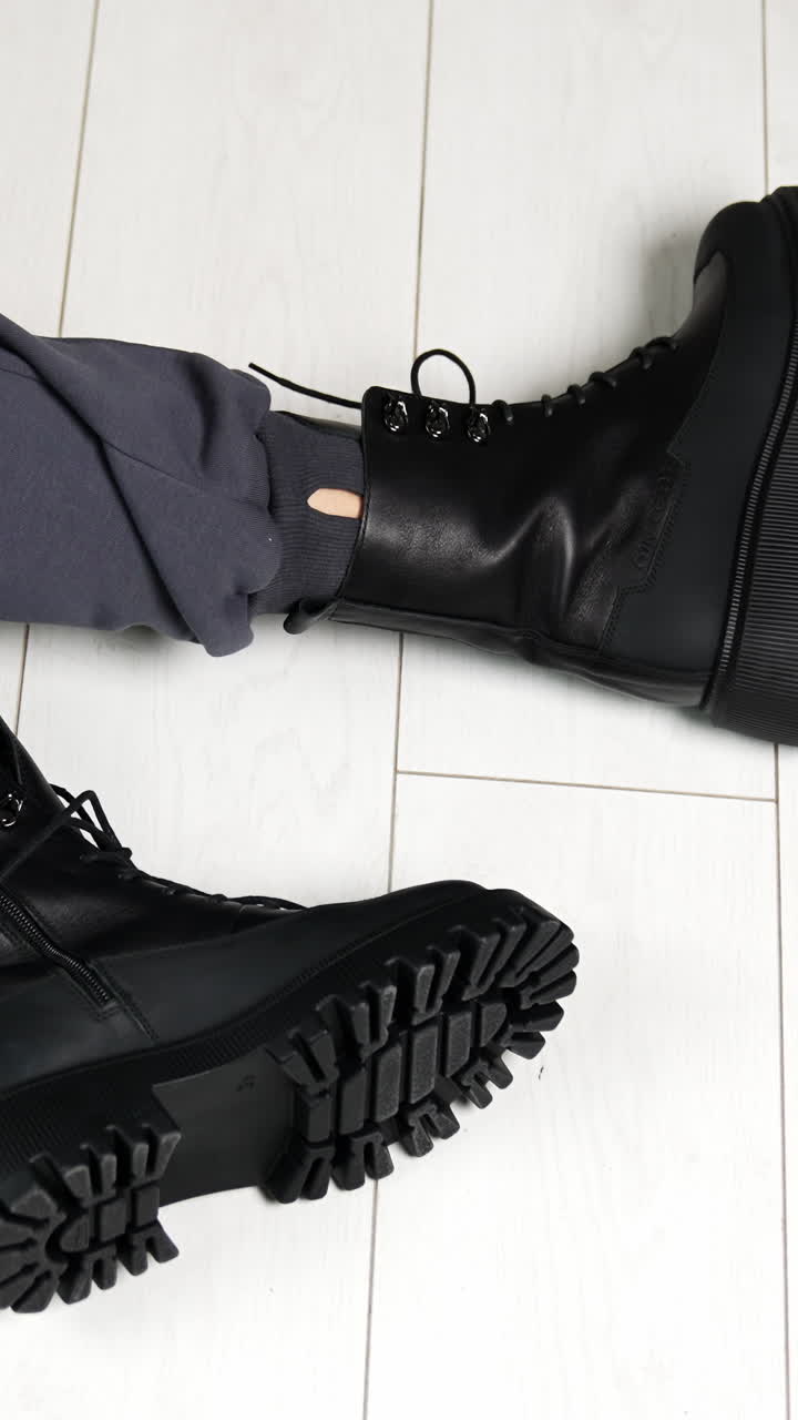 Elegant woman fashion shoes posing. Women footwear showroom. Vertical video