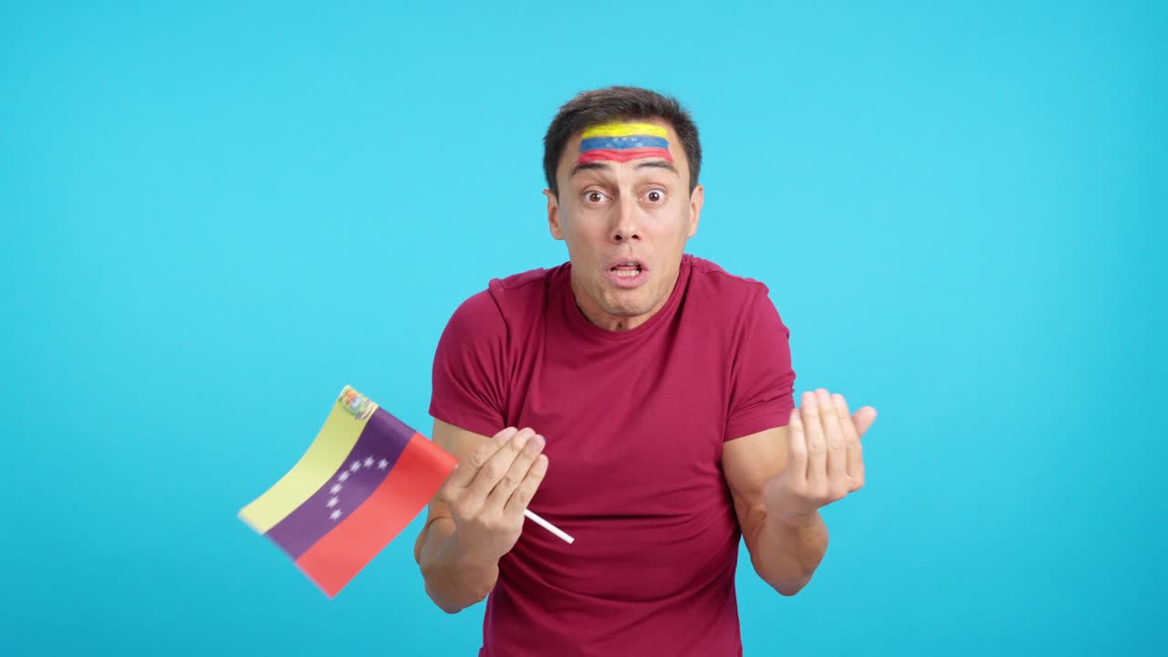 Man Cheering for Venezuela, angry with the decision of referee