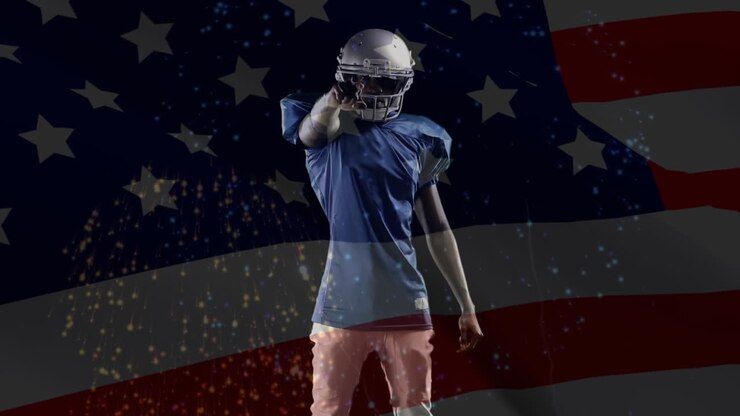 amerikanischer fußballspieler mit amerikanischer flagge und feuerwerk