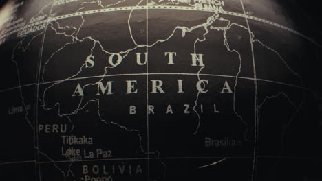 close-up of a globe focused on south america