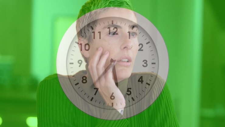 Woman working laptop in business, clock overlay ticking, causing pause, touching eye, gazing away