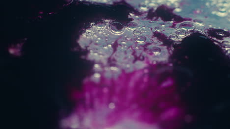 Colourful, organic, liquids macro shots buzzing and flowing
