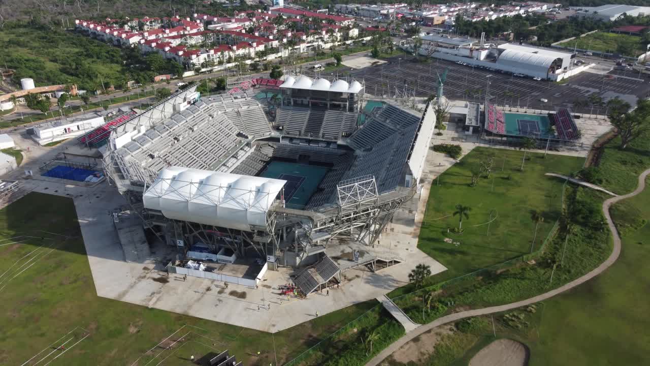 structure of a sports stadium with a frontal shot zooming out with the movement of a drone