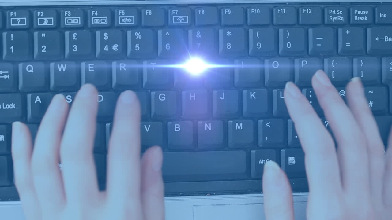 Animation of tight trails over hands typing on keyboard
