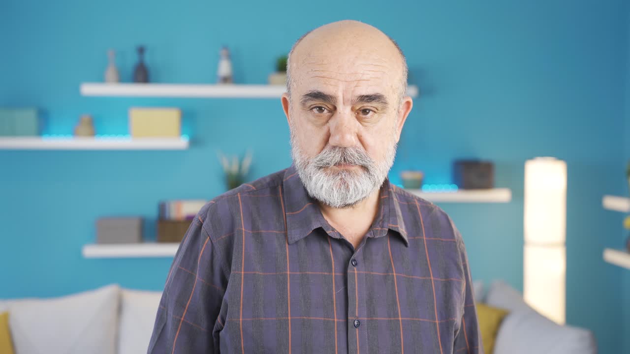 Portrait of sad and unhappy old man.