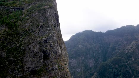 Ascend-to-the-summit-of-Madeira's-highest-peaks-with-the-drone,-where-panoramic-views-stretch-as-far-as-the-eye-can-see,-rewarding-adventurers-with-a-sense-of-awe