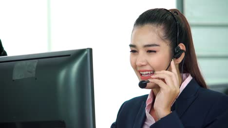 business people wearing headset working in office