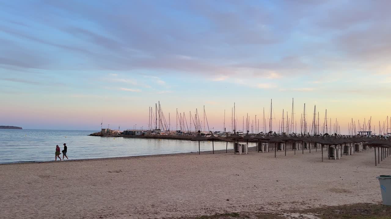 Spanish beach evening, boats moored marina port, tranquil day Can Pastilla Spain