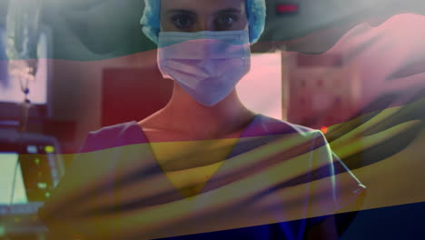 animation of flag of germany waving over anesthesiologist in operating theatre