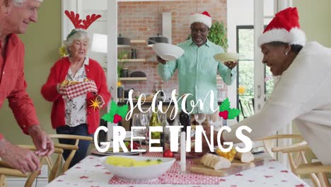 Animation-of-christmas-greetings-text-over-senior-diverse-friends-at-christmas-meal-table