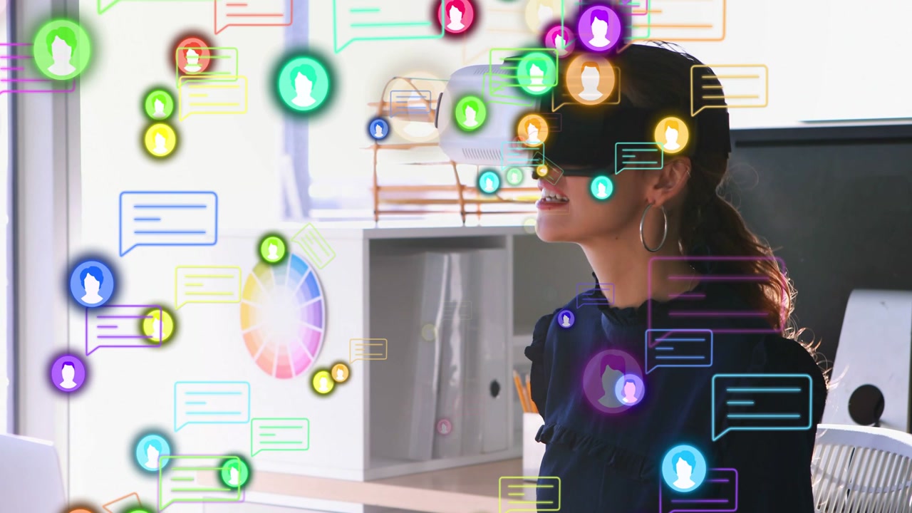 Female wearing white VR headset at desk activating interface and scanning rising icons for design