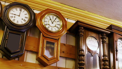 clocks for repair hanging on the wall