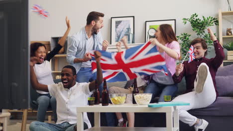 friends celebrating a uk sports event