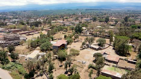 Birdseye-aerial-view-of-loitokitok-rural-village,-shanty-poor-neighborhood-of-Nairobi,-Kenya