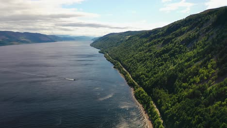 Aerial-View-Of-Loch-Ness-And-Surrounding-Forests-In-Scotland