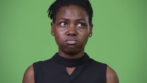 young beautiful african businesswoman looking bored