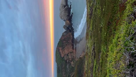 incredible view of the sunset with orange colors on the coast.