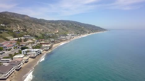 slow motion malibu beach house on highway one