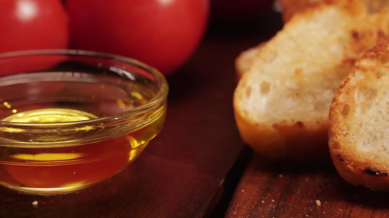 Delicious tapas bread with tomatoes pasta with olive oil close-up, bruschetta with red sauce ketchup, olives dry tomatoes and tasty sandwich bar appetizer, buffet