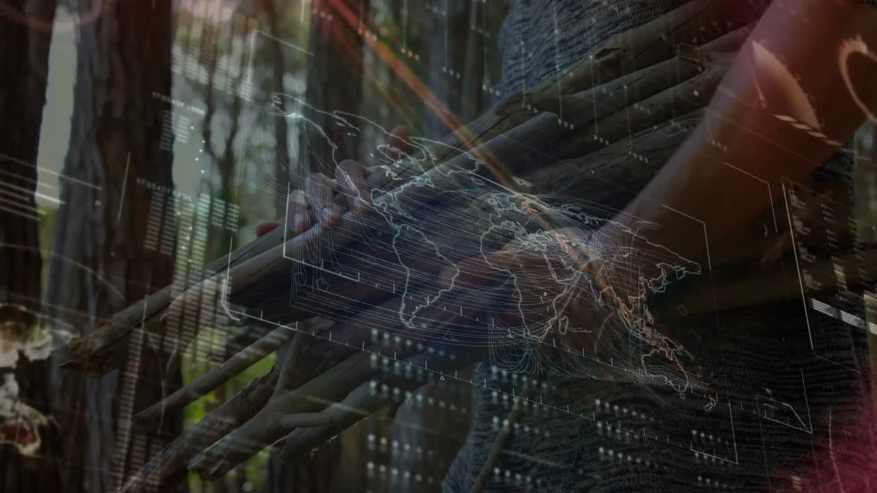 Adult male carrying sticks activating tech holographic map animating data bars for forest analysis