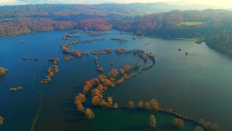 aerial 4k drone footage of a planina plain , slovenia