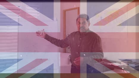 animation of uk flag over biracial male teacher