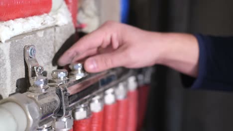 professional plumber installs pipes for boiler heating professional plumber installs pipes for boiler heating home renovation