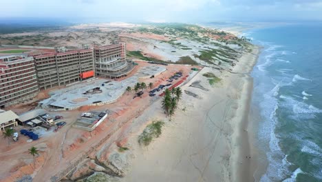 aerial view of coastal construction project near phan thiet, showcasing beachside development in binh thuan province, vietnam, with sandy beaches and scenic ocean views