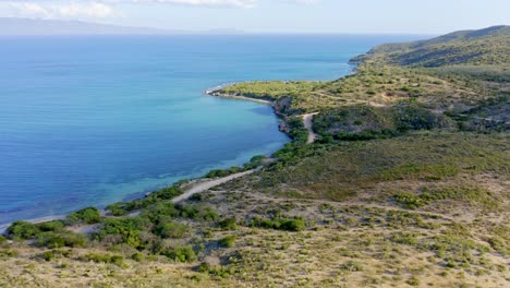 Coastal-landscape-at-Monte-Rio-beach-on-untouched-south-shore-of-Dominican-Republic,-aerial