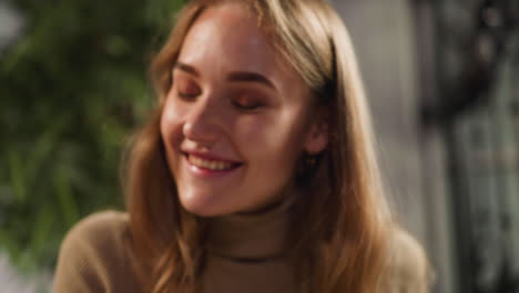 surprised positive lady nods on blurred background in room