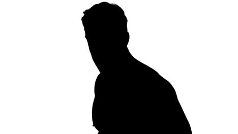 muscular silhouette of man boxing