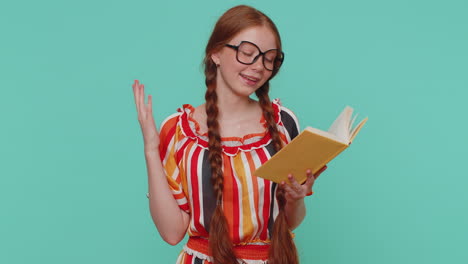 Redhead-girl-reading-funny-interesting-fairytale-story-book,-leisure-hobby,-education,-learning