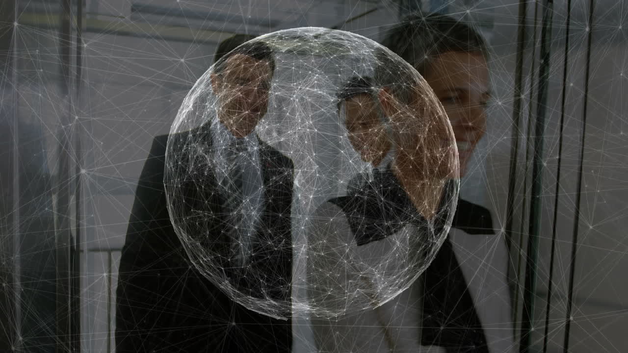 Business professionals walking through office corridor, showing digital network sphere hologram
