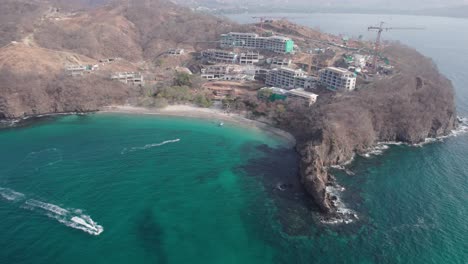 aerial shoot of exotic turquoise playa penca beach in guanacaste, costa rica