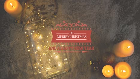animación de saludos de navidad texto sobre velas de navidad y decoración.
