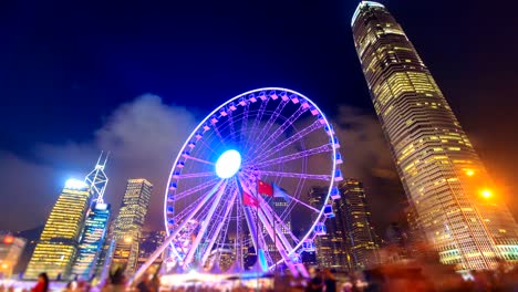 night hong kong observation ferris wheel landmark travel places of hong kong 4k time lapse (tilt up)